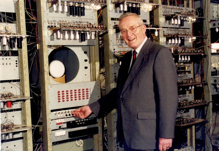 Tom Kilburn with the replica 'Baby' computer at the Museum of Science and Industry, 1 November 2000