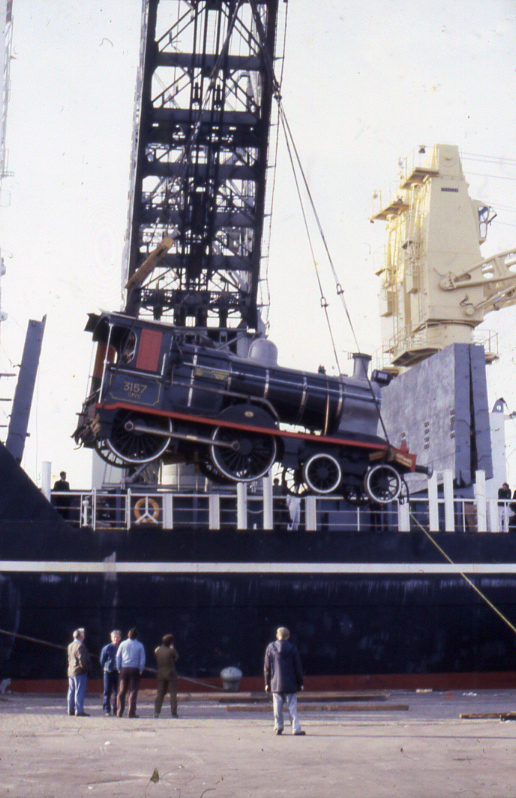 Offloading of engine and tender at Liverpool Docks by the 'Mammoth' floating crane
