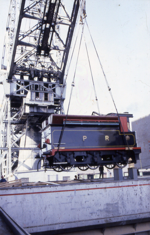 Offloading of engine and tender at Liverpool Docks by the 'Mammoth' floating crane