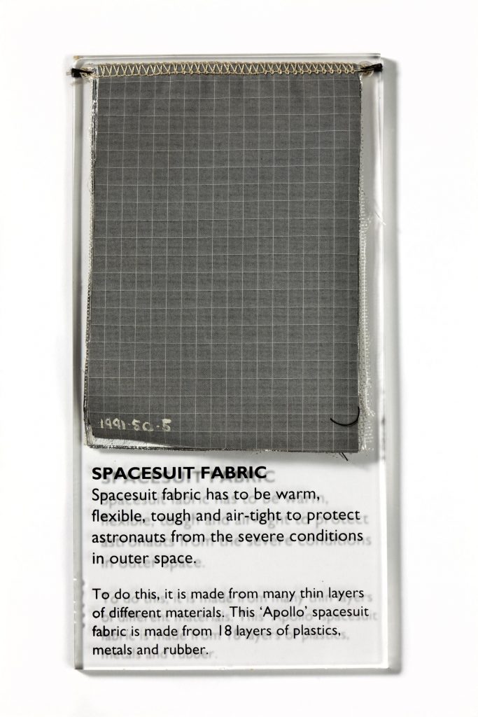 A swatch of grey fabric, of the same kind used in the Apollo spacesuits