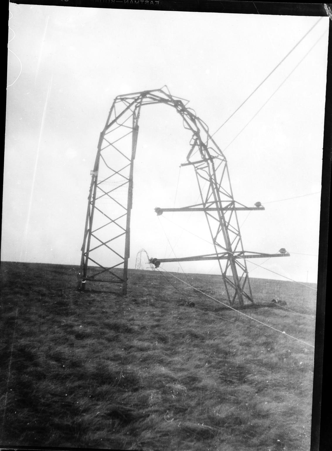 W T Glover & Co photograph of a pylon failure