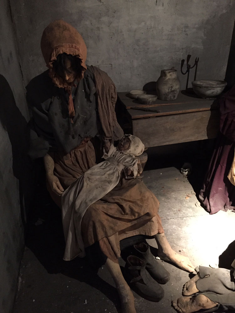 A display in a museum depicting Victorian squalor