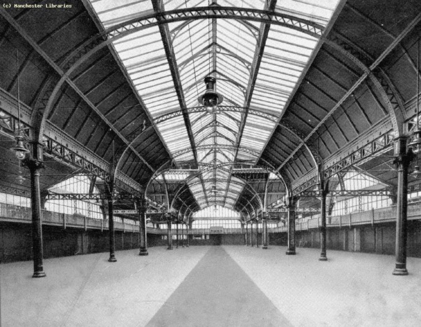 Black and white photo of the interior of an old market hall