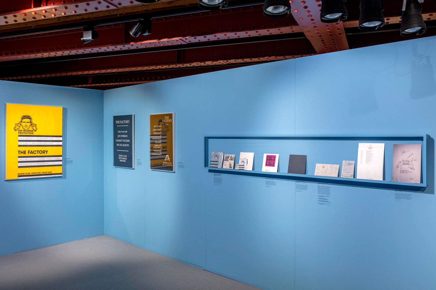 Gallery view of part of the FAC 1-50 display in Use Hearing Protection: The early years of Factory Records at the Science and Industry Museum