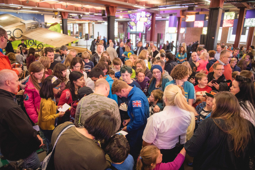 Picture of Tim Peake signing autographs at the Museum of Science and Industry