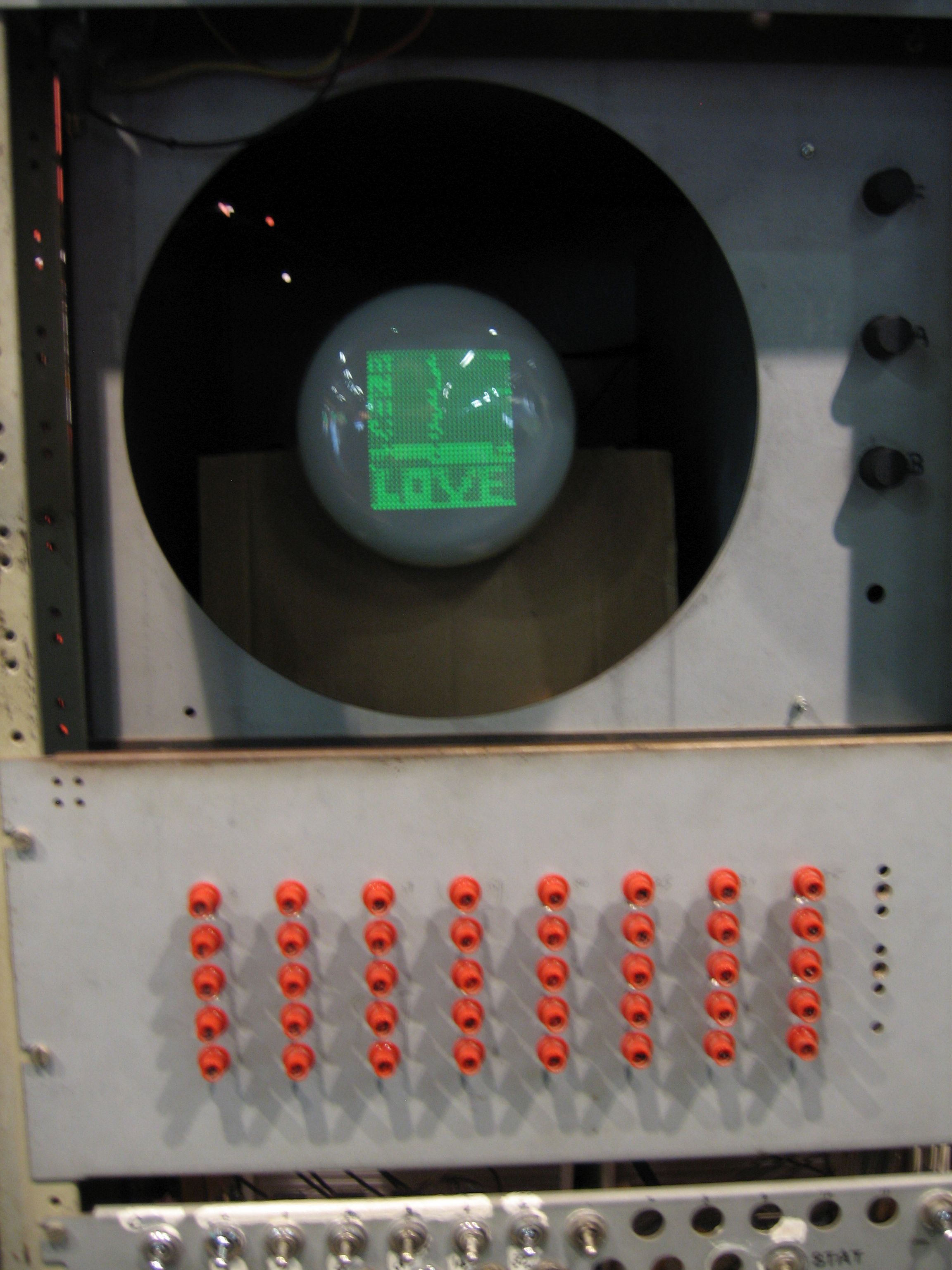 The word 'Love' written in code, on the screen of the Baby replica at the Museum of Science and Industry