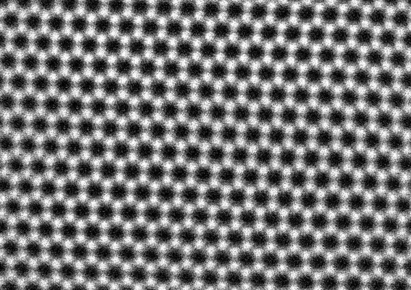 Scanning transmission electron microscope image showing the hexagonal atomic structure of graphene. Each white spot is a single carbon atom. Image credit: Sarah Haigh, University of Manchester and Quentin Ramasse, EPSRC SuperSTEM Laboratory, Daresbury 