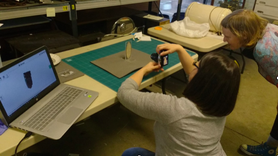 Two women working at a computer