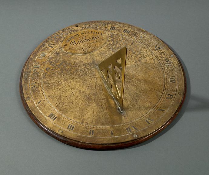 An ornate brass sundial that was used at Liverpool Road Station in the 19th century