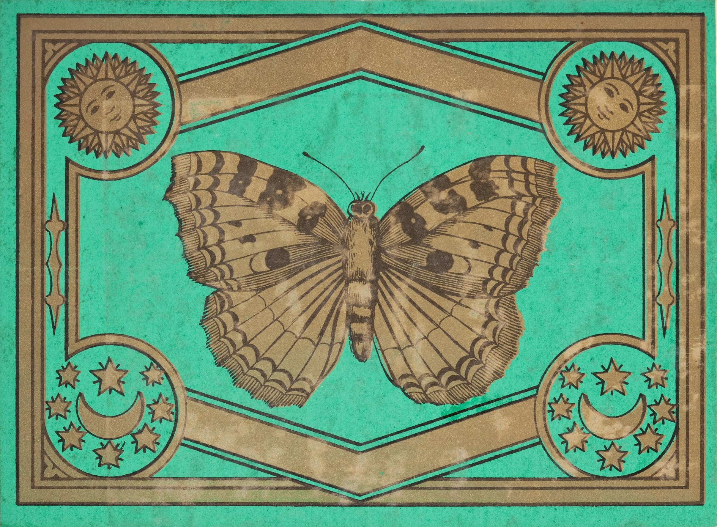 A shipper's ticket from the collection at the Museum of Science and Industry showing a pale brown butterfly on a turquise background