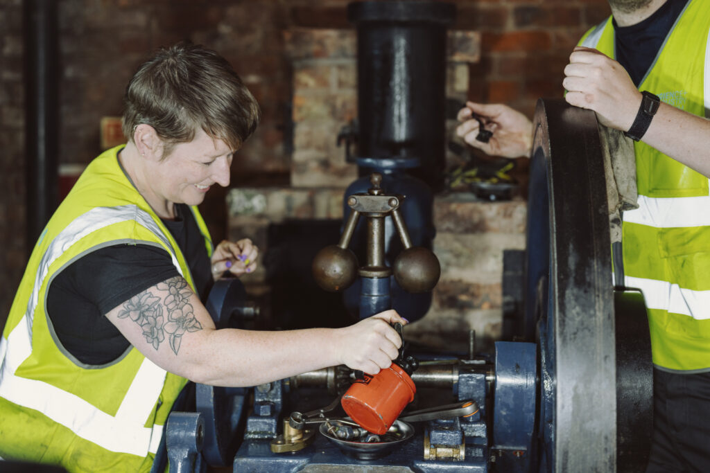 Technicians working on a machine