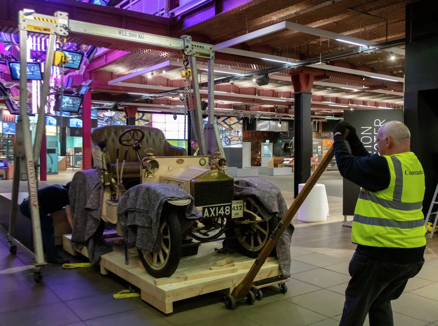 Getting the Rolls-Royce into position below the crane