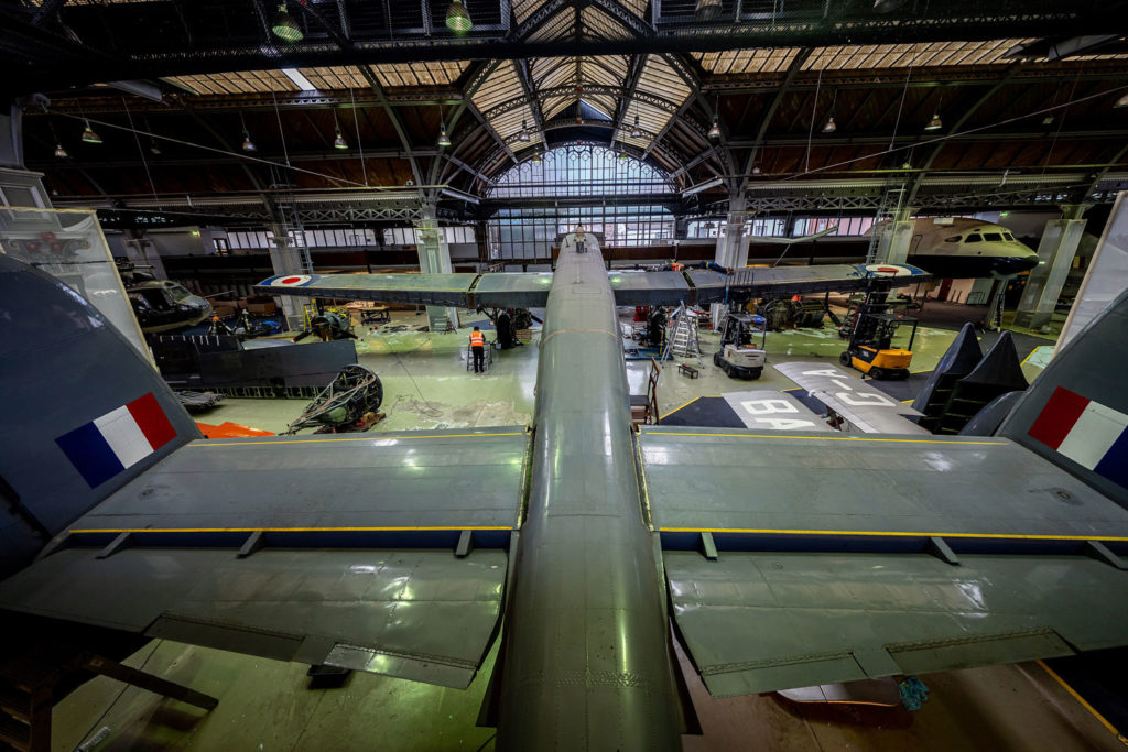 A plane inside a museum gallery