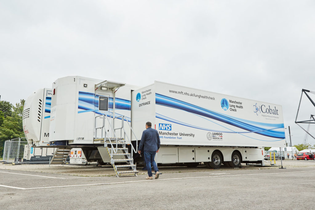 A mobile medical unit in a car park