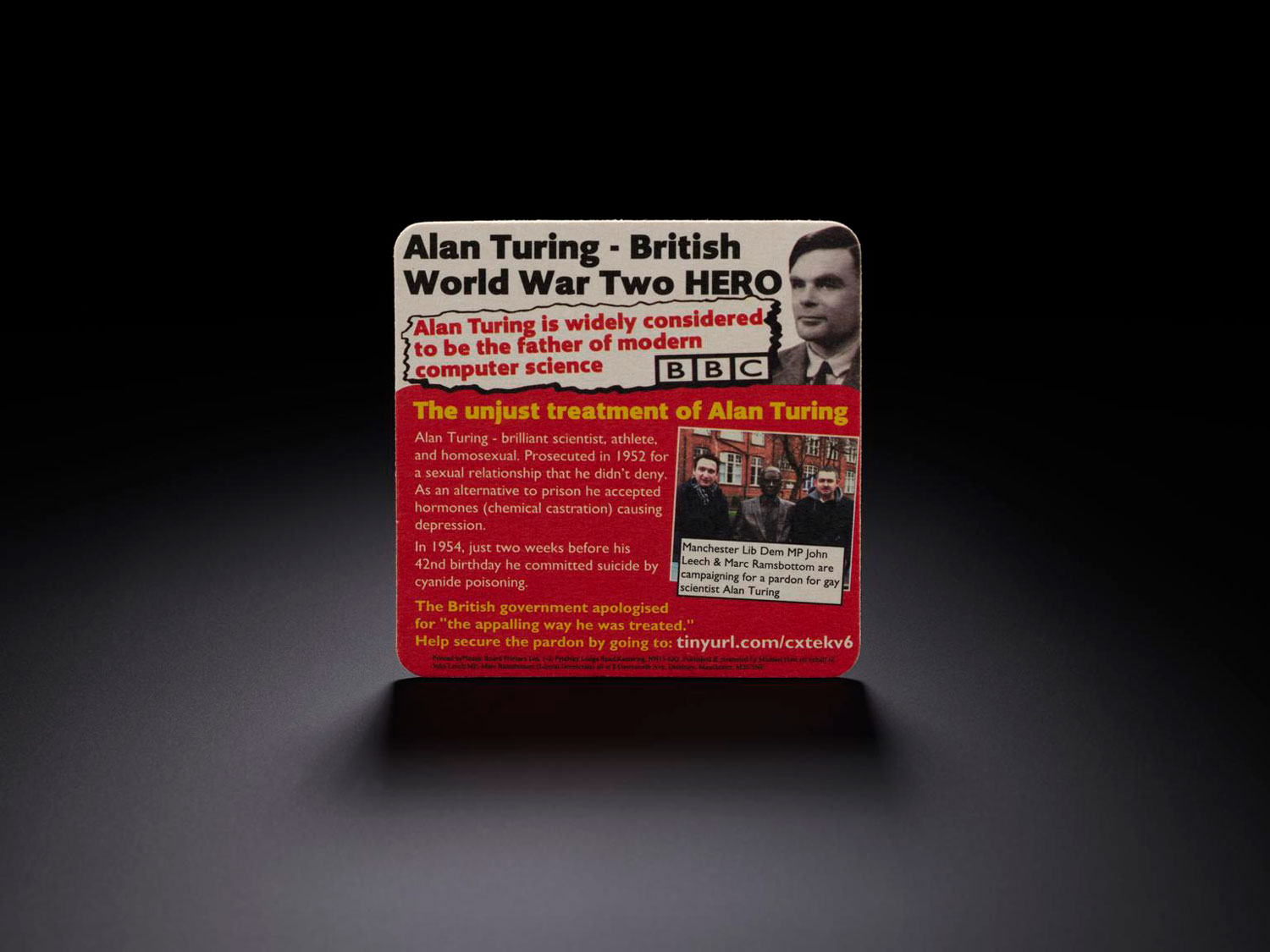 A beer mat with a message about Alan Turing's contribution to the Second World War written on it.