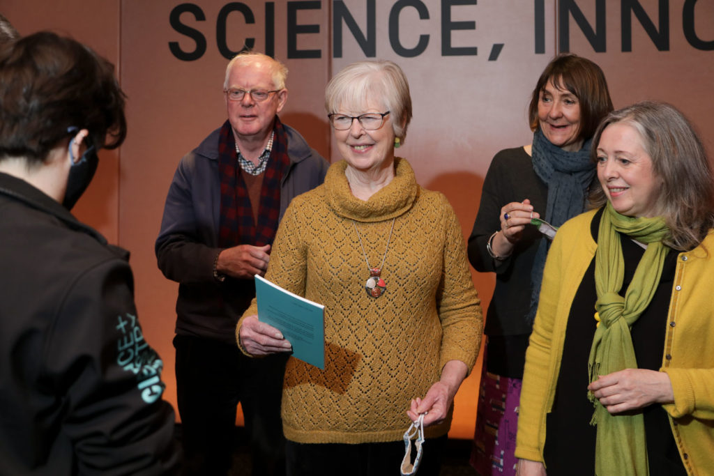 A group of people looking at a museum Explainer