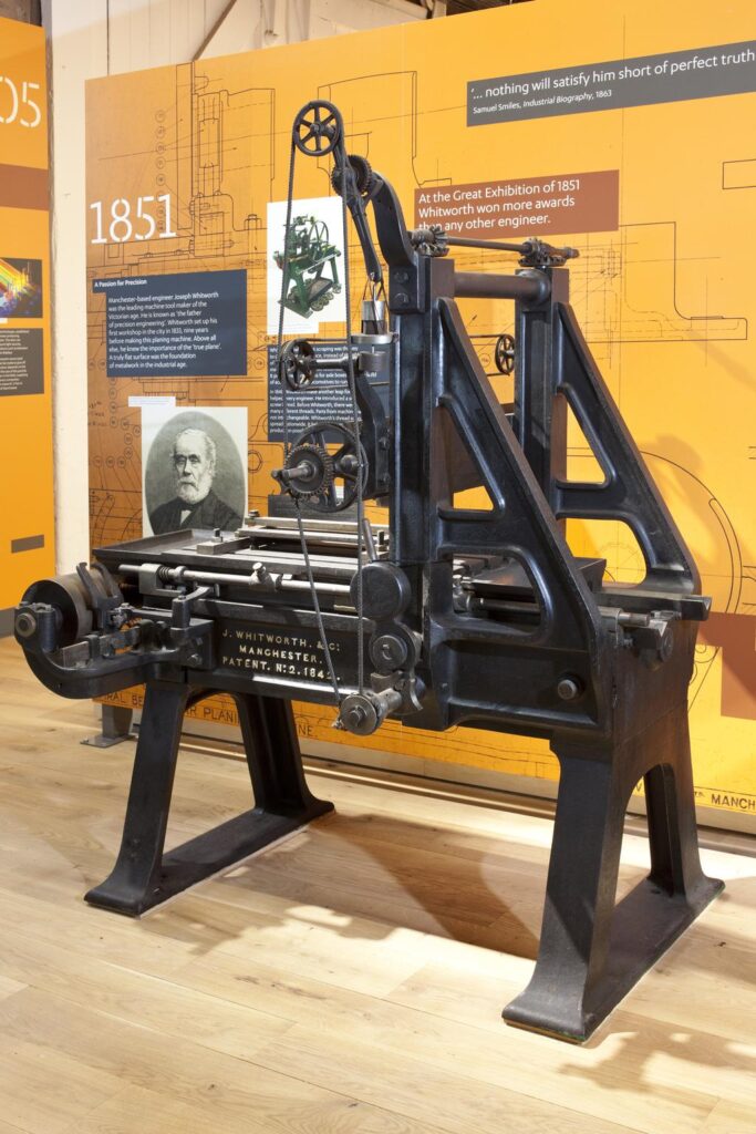 19th century industrial machinery on display in a museum