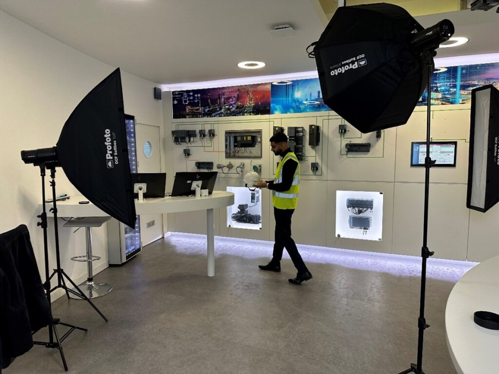 A man stood with photography equipment