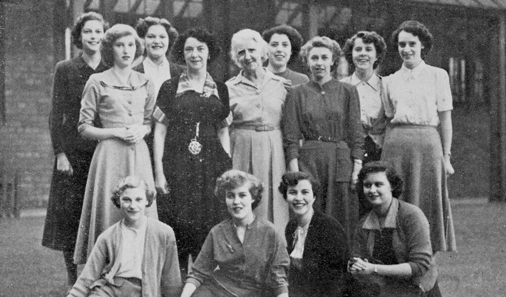 Black and white photo of a group of women