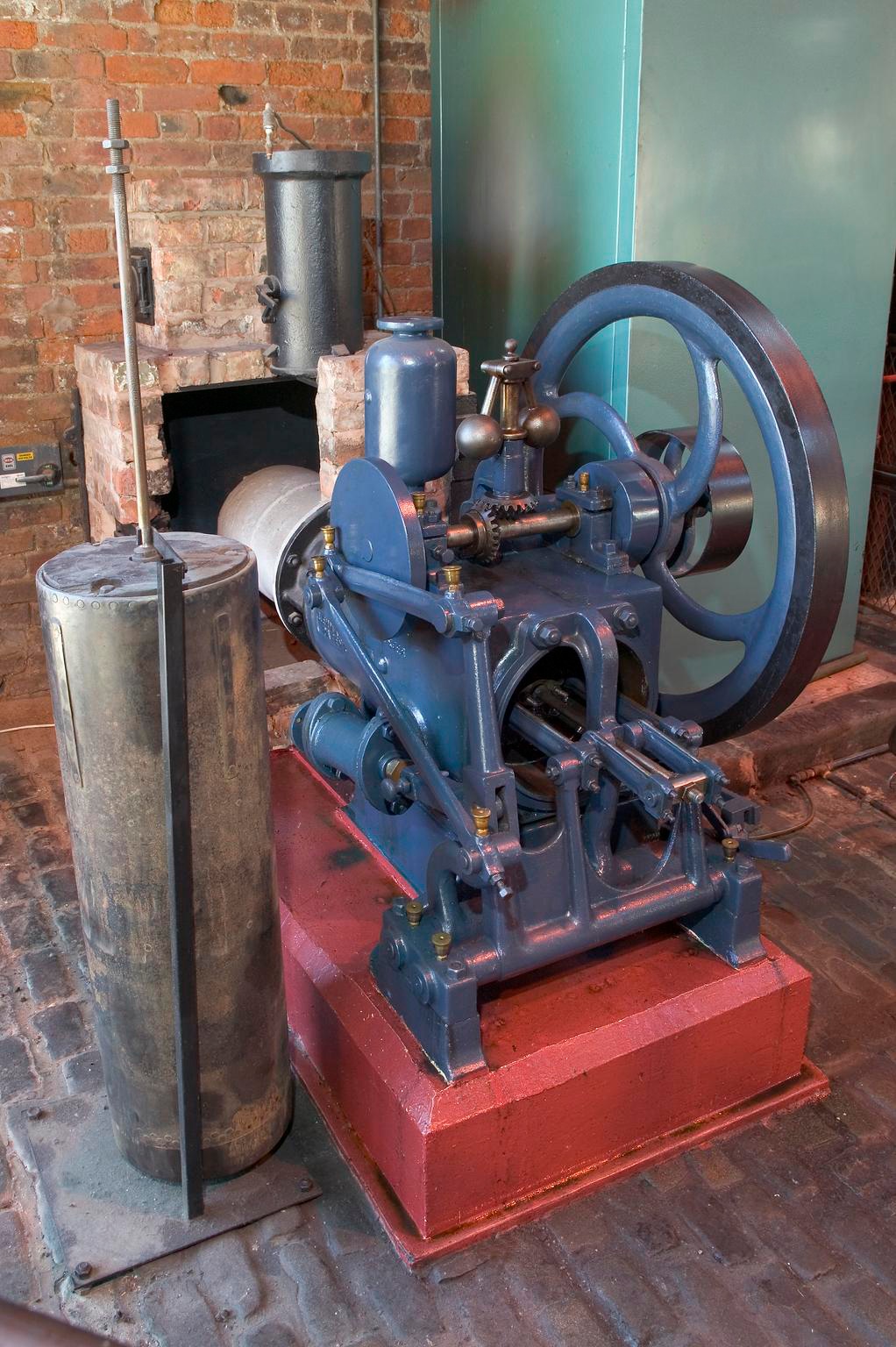 19th century hot air engine on display in a museum